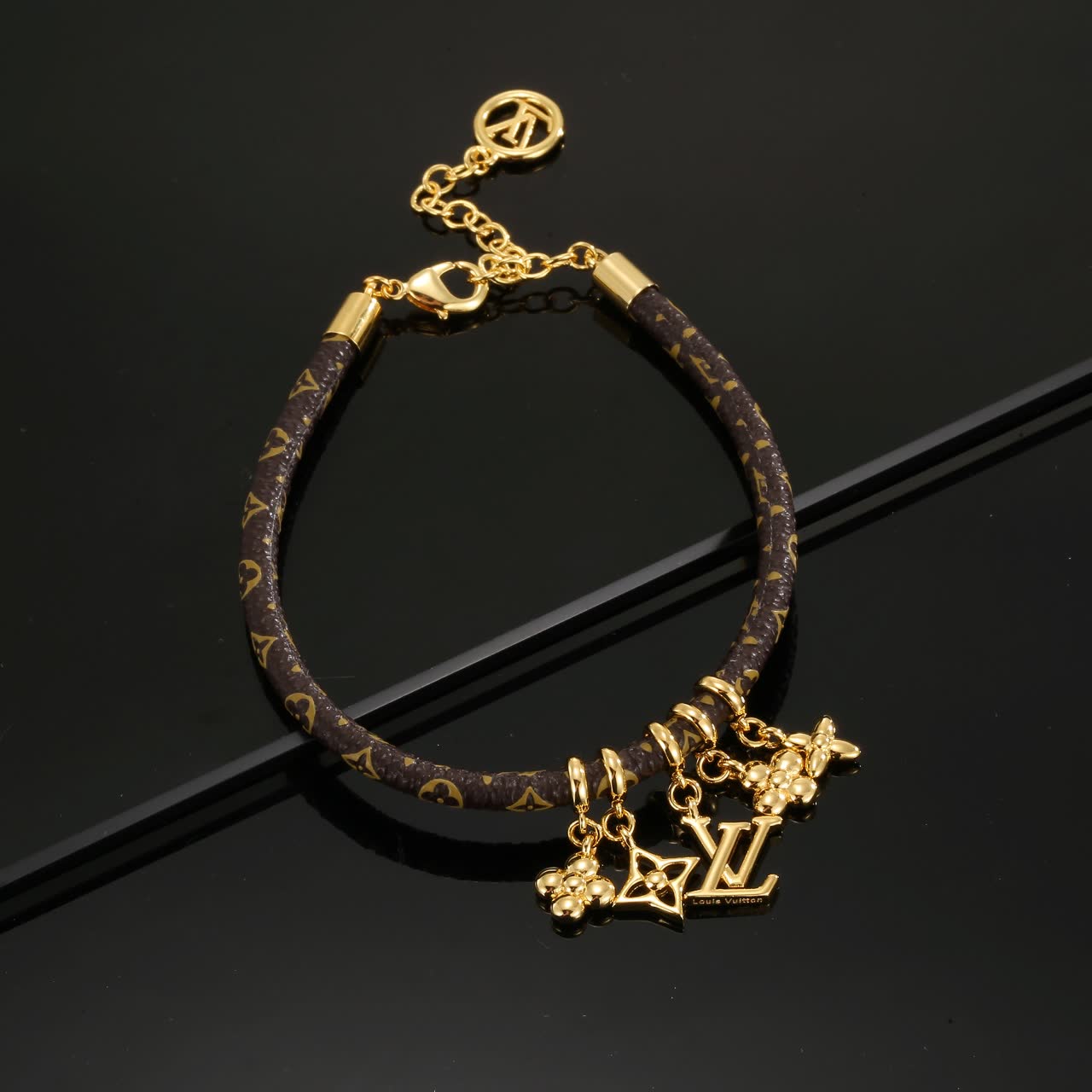 Louis Vuitton Monogram Leather Bracelet with Gold Charms
